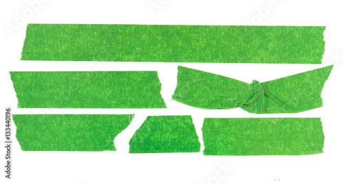 Set of green masking tape pieces