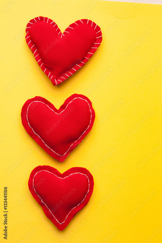fabric red hearts on a yellow background