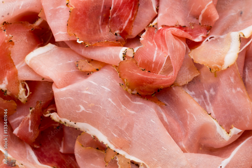 Prosciutto di Parma or Parma Ham. Window Light. Soft Focus Prosciutto di Parma or Parma Ham. Window Light. Soft Focus