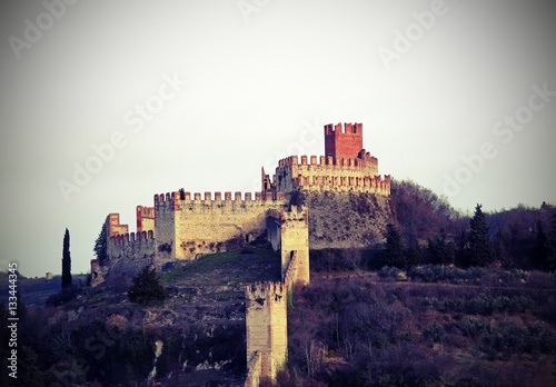 Fototapeta Magnificent Castle Soave ancient medieval prison in the Province