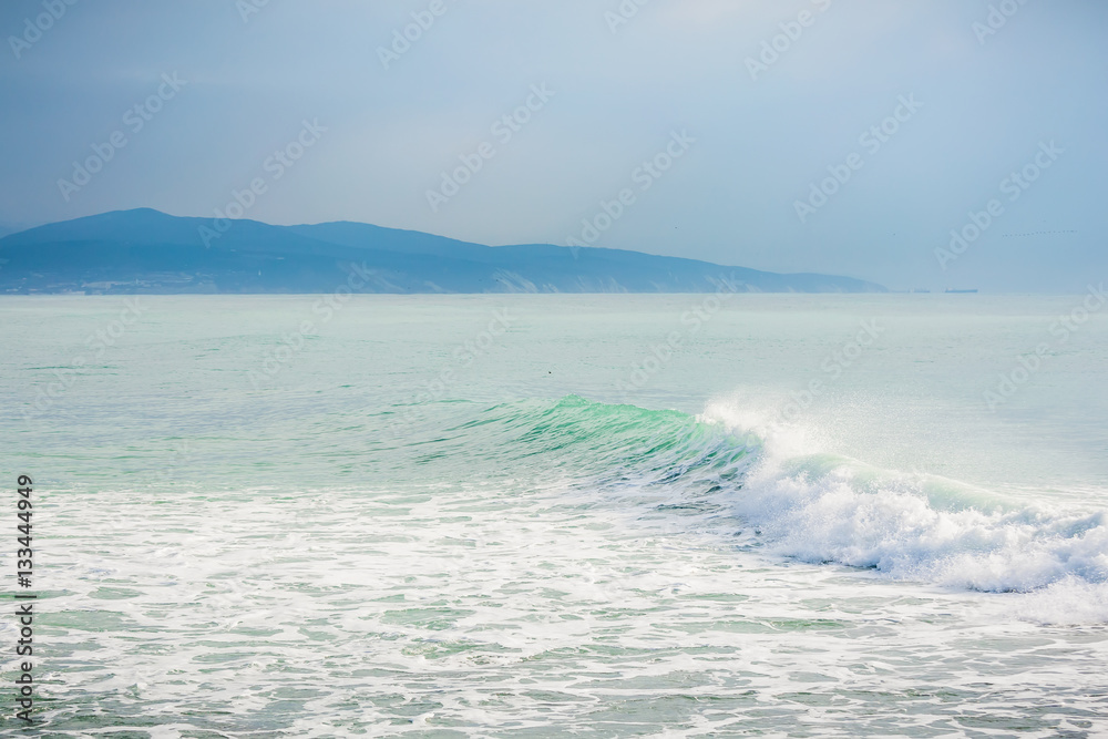 Turquoise wave in ocean.