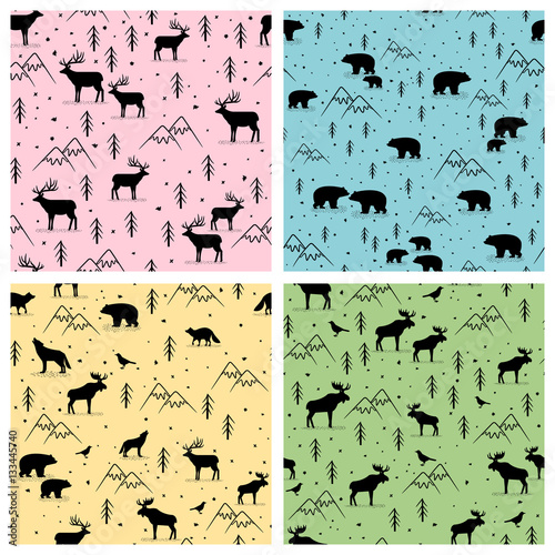 Set of four seamless pattern with wild animals on different backgrounds © ianakauri