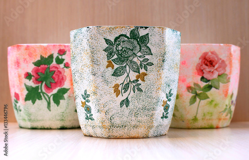 Beautiful decorative flowerpot handmade with decoupage style 