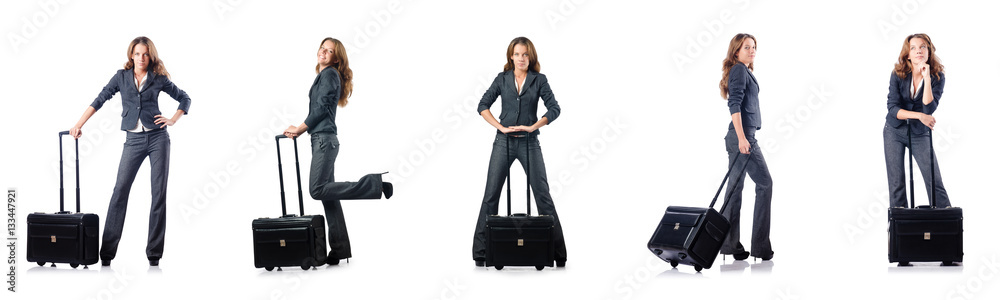Businesswoman with suitcase on white