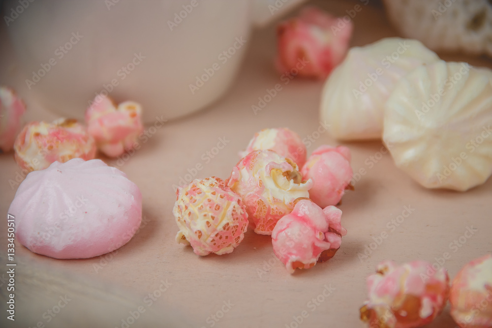 beze, popcorn on wooden background beze, popcorn on wooden background