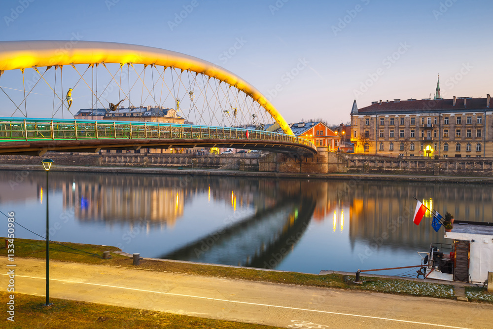 Fototapeta premium Bernatka footbridge over Vistula river in Krakow, Poland