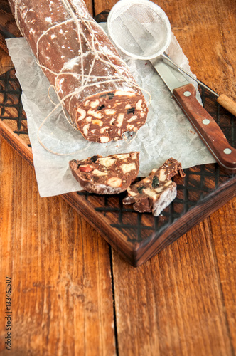 Сhocolate salami on a wooden board