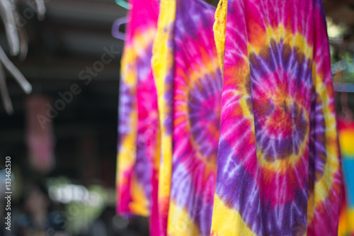 Multi-colored Batik fabric. Tie dye fabric. dry clothes in the sun