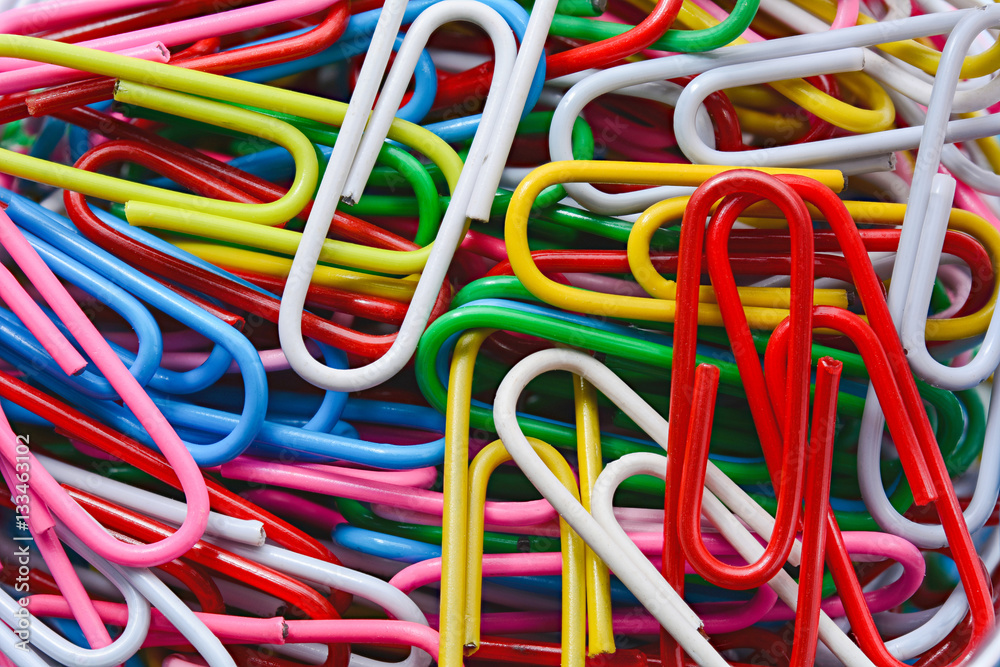 colored paperclips background colored paperclips background
