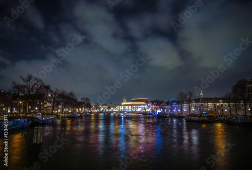 AMSTERDAM, NETHERLANDS - JANUARY 12, 2017: Beautiful night city canals of Amsterdam. January 12, 2017 in Amsterdam - Netherland. © Unique Vision