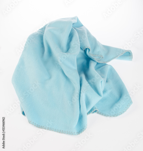 blanket or soft warm blanket on background. © heinteh