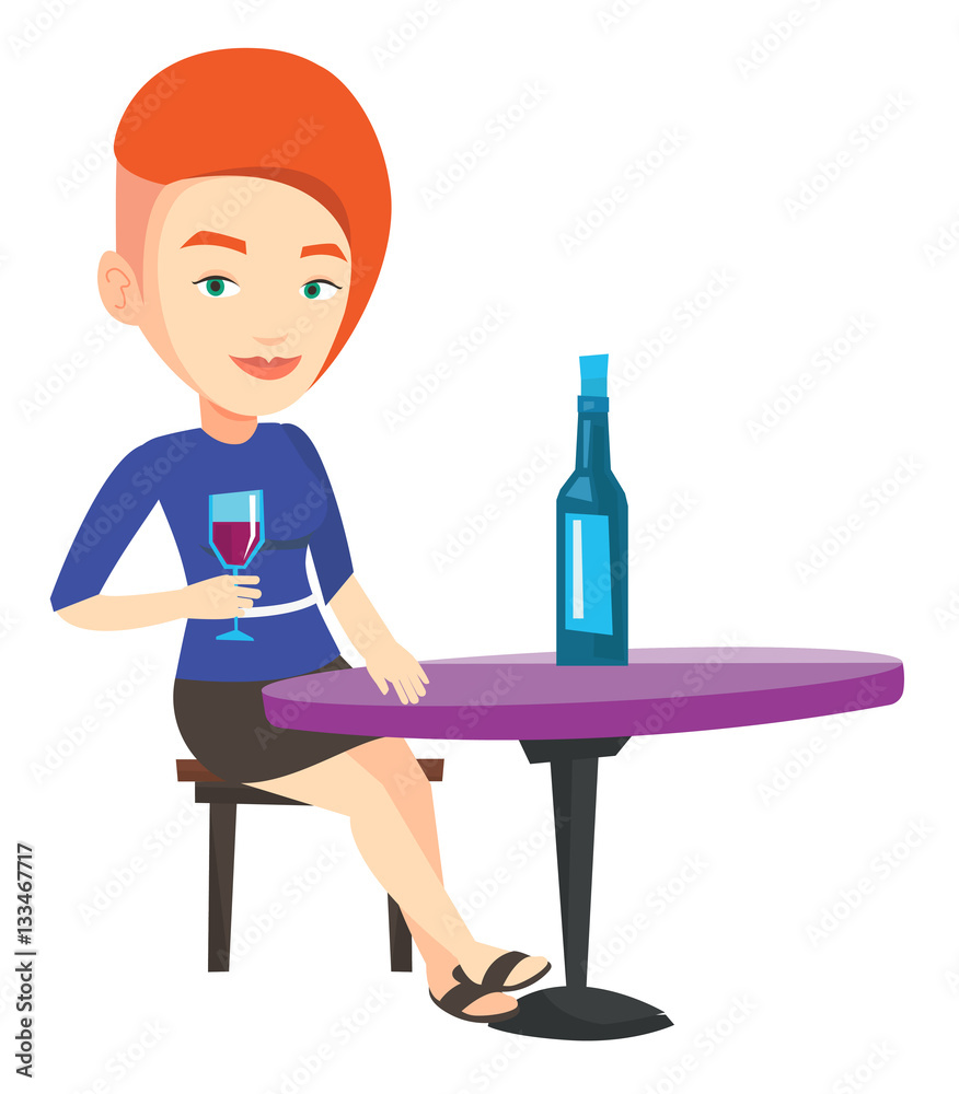 Woman drinking wine at restaurant. Woman drinking wine at restaurant.