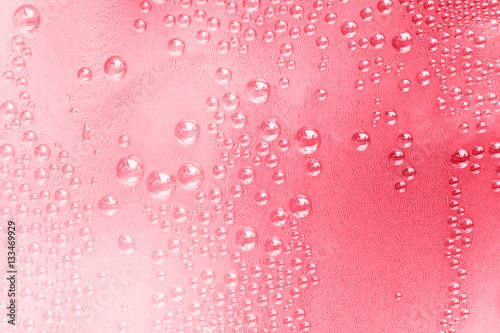 Pink water drops background