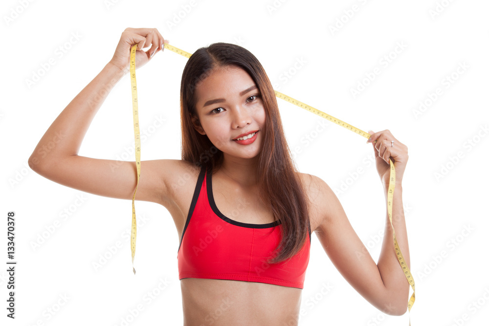 Beautiful Asian healthy girl with measuring tape. Beautiful Asian healthy girl with measuring tape.