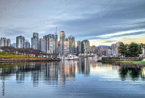 Sunset at city harbor. False Creek from Granville Island. Yaletown. Vancouver. British Columbica. Canada.