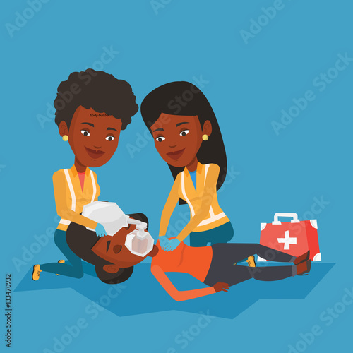 Paramedics doing cardiopulmonary resuscitation.