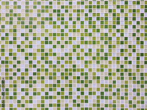 green of mosaic tiles wall background.