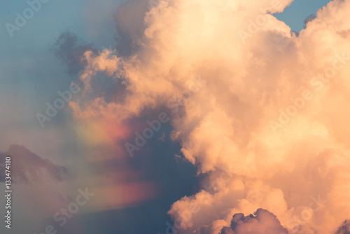 Sunlight cloud and sky at sunset with rainbow.
