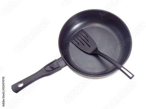 Frying pan with ceramic non-stick coating and plastic spatula