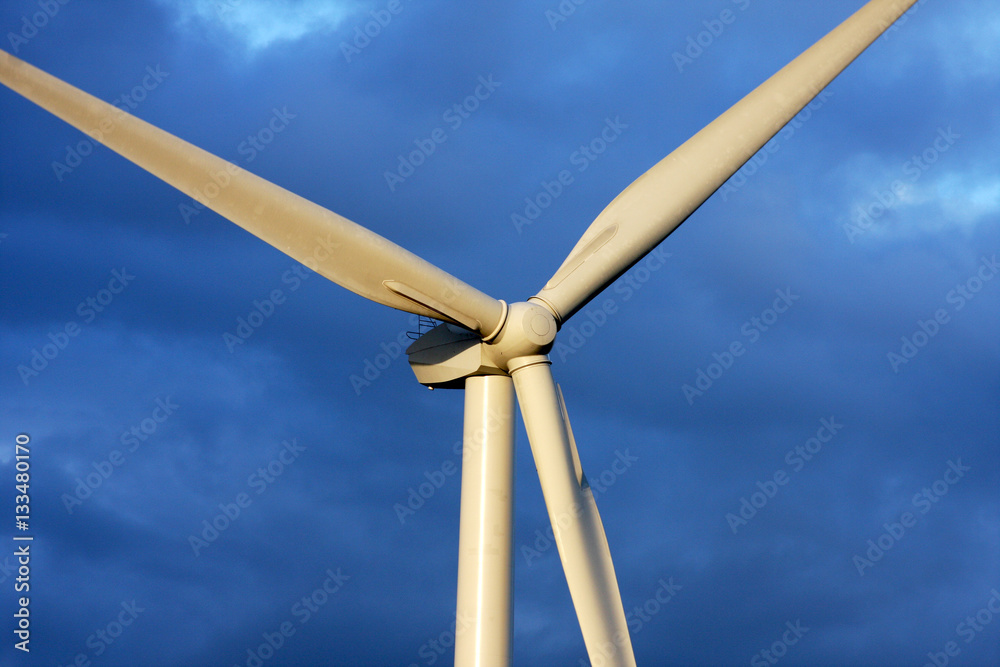 Head of modern wind turbine to generate electricity in a green manner.