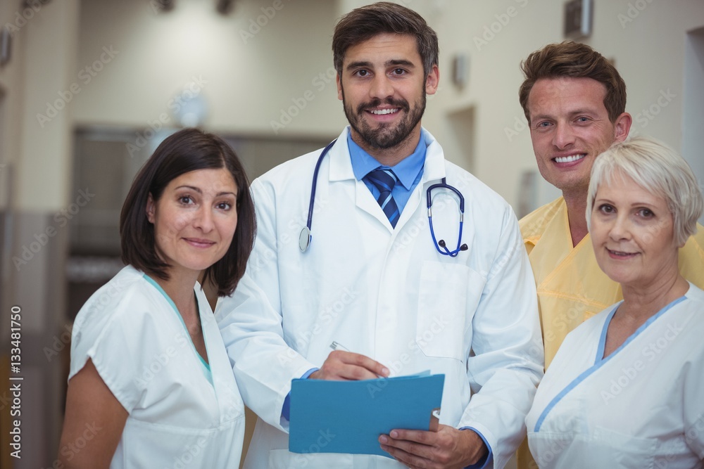 Portrait of doctor and nurse having discussion Portrait of doctor and nurse having discussion