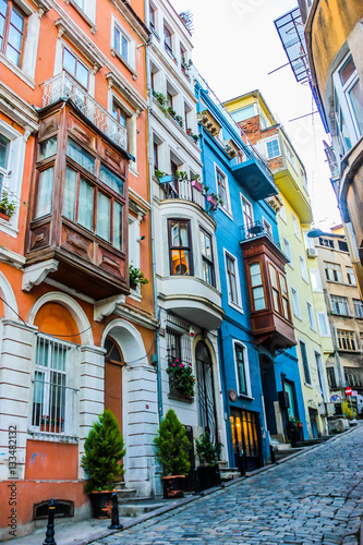 Narrow street with colourful houses. Istanbul, Turkey © sforzza