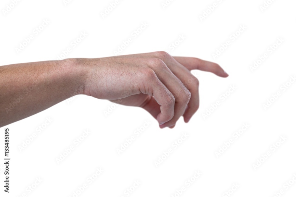 Hand of man pretending to touch an invisible screen Hand of man pretending to touch an invisible screen