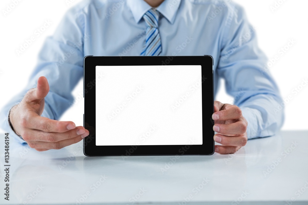 Businessman showing a digital tablet Businessman showing a digital tablet
