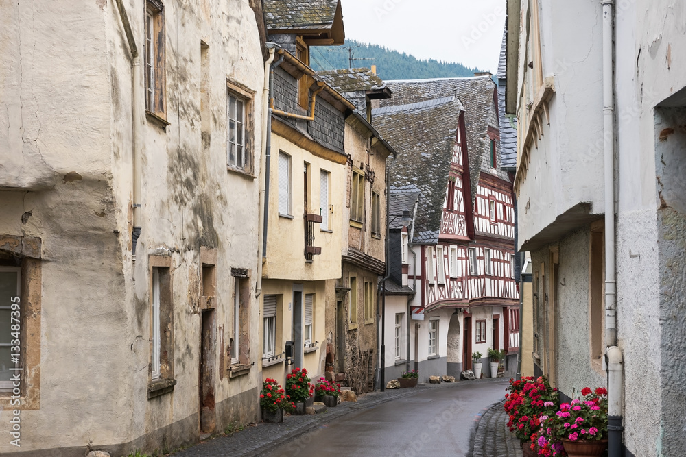 The central street of the medieval village of  Enkirch situated on the  Moselle river, Germany