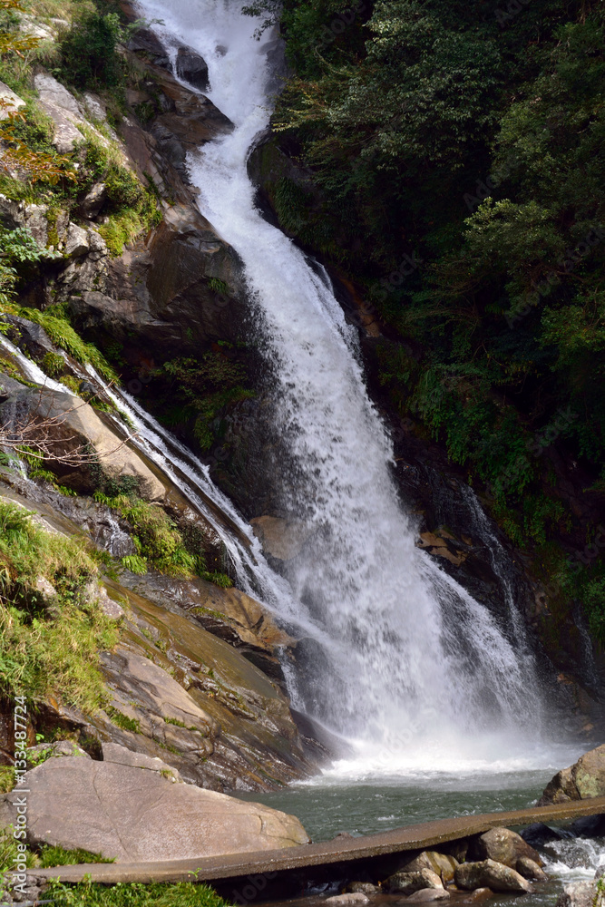 Ouchi town, Karatsu city, Saga, JAPAN, October 15 2016: Waterfall of Ikisa river. It is in October. Ouchi town, Karatsu city, Saga, JAPAN, October 15 2016: Waterfall of Ikisa river. It is in October.