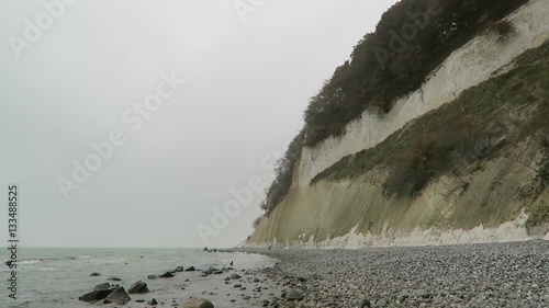 Rugen island chalk rock cliff landscape in autumn time. colorful beech tree forest. (Mecklenburg-Vorpommern, Germany). Baltic sea photo