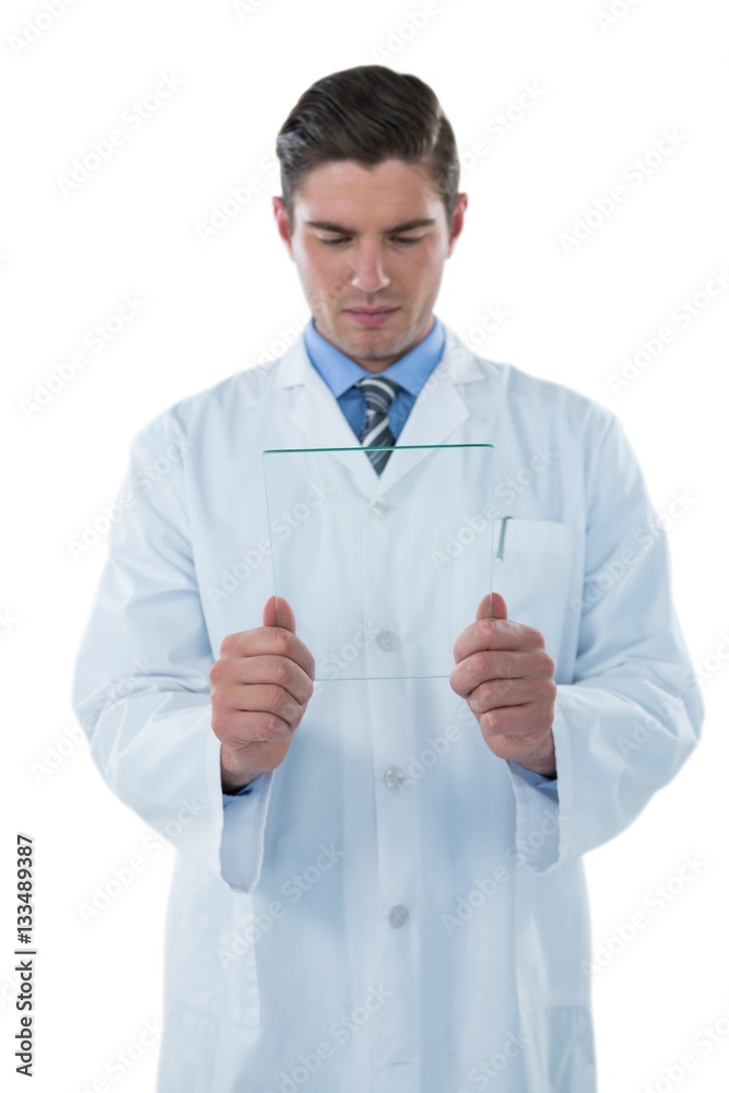Male doctor using an futuristic digital tablet Male doctor using an futuristic digital tablet