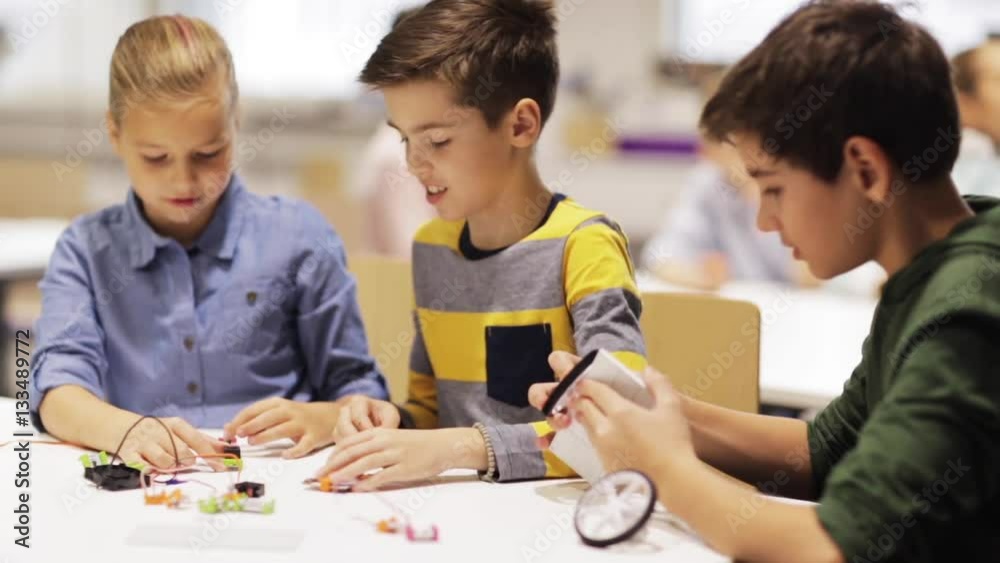 happy children learning at robotics school happy children learning at robotics school
