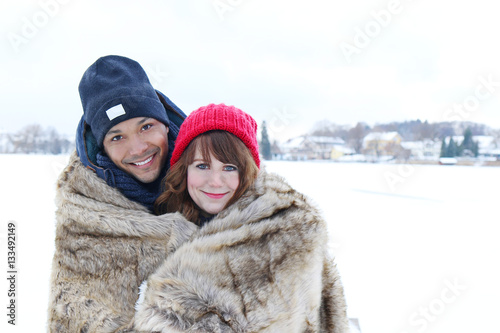 Loving couple in winter outside copy space