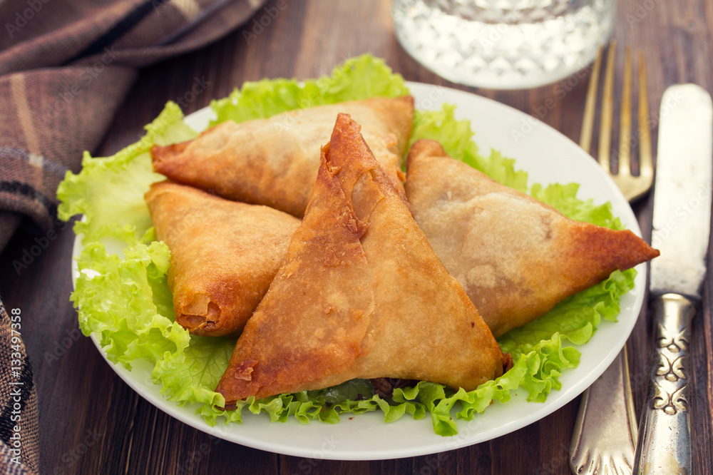 typical portuguese snack chamucas on plate typical portuguese snack chamucas on plate