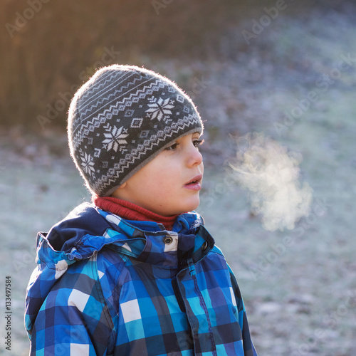 Child on cold frosty day