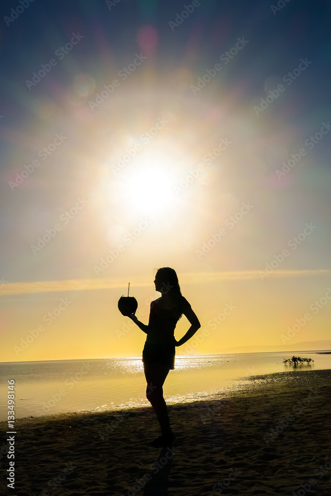 Pretty Woman Profile with Coconut on Beach
