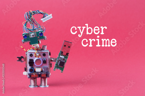 Cybercrime and data hacking concept. Retro robot with usb flash storage stick, stylish computer character blue eyed head, electrical wire hairstyle. Pink background photo