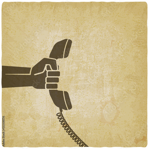 hand with telephone handset