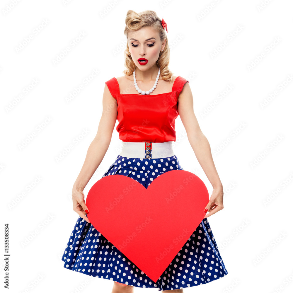 woman holding heart symbol, in pin-up style woman holding heart symbol, in pin-up style