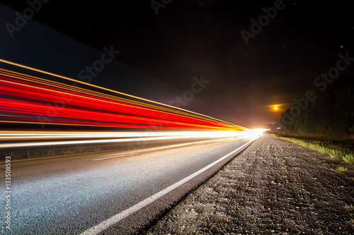 Photo of country road with traces of light vehicles