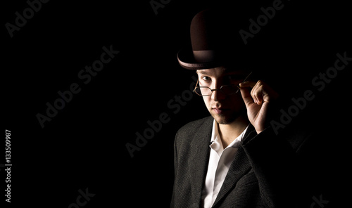 Portrait of young and attractive gentleman in tero style wearing