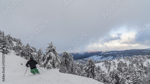 Skiing on top of the snowy olympus mountain