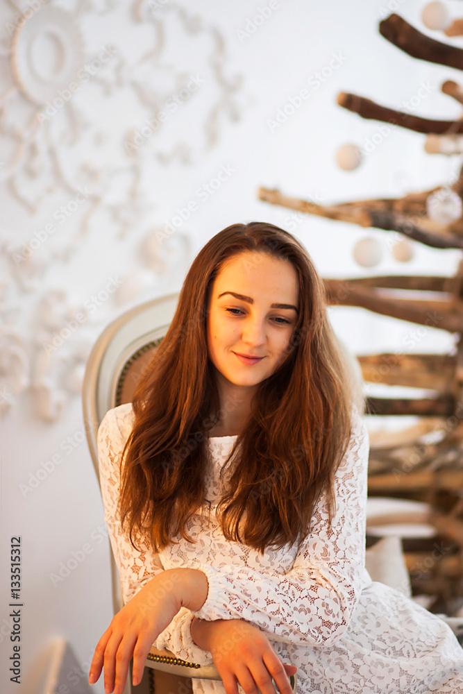 Cute girl posing in chair Cute girl posing in chair