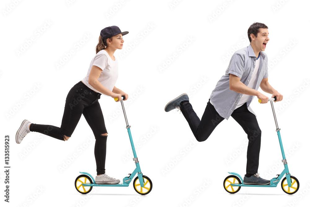 Girl and a guy riding scooters Girl and a guy riding scooters