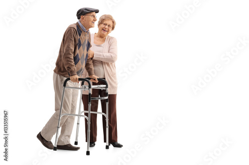 фотографія Mature woman helping a mature man with a walker
