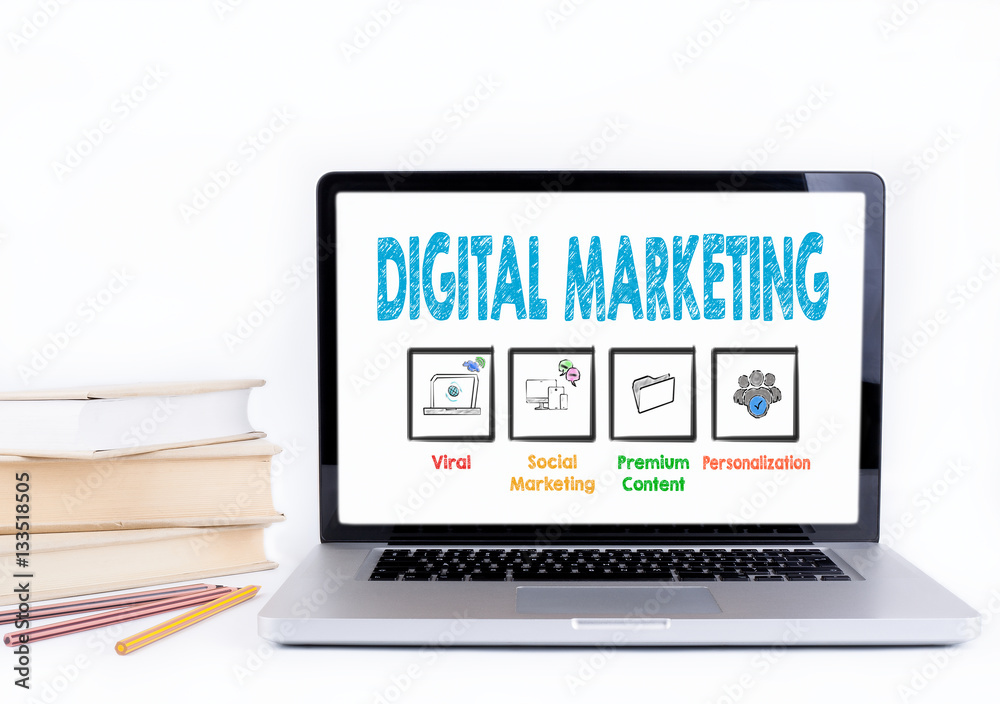 Digital Marketing. Laptop and books on a white background. Digital Marketing. Laptop and books on a white background.
