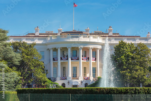 The White House in Washington DC with beautiful blue sky at summer. photo