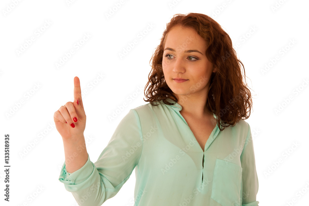 Business woman pointing to copy space while presenting a product Business woman pointing to copy space while presenting a product