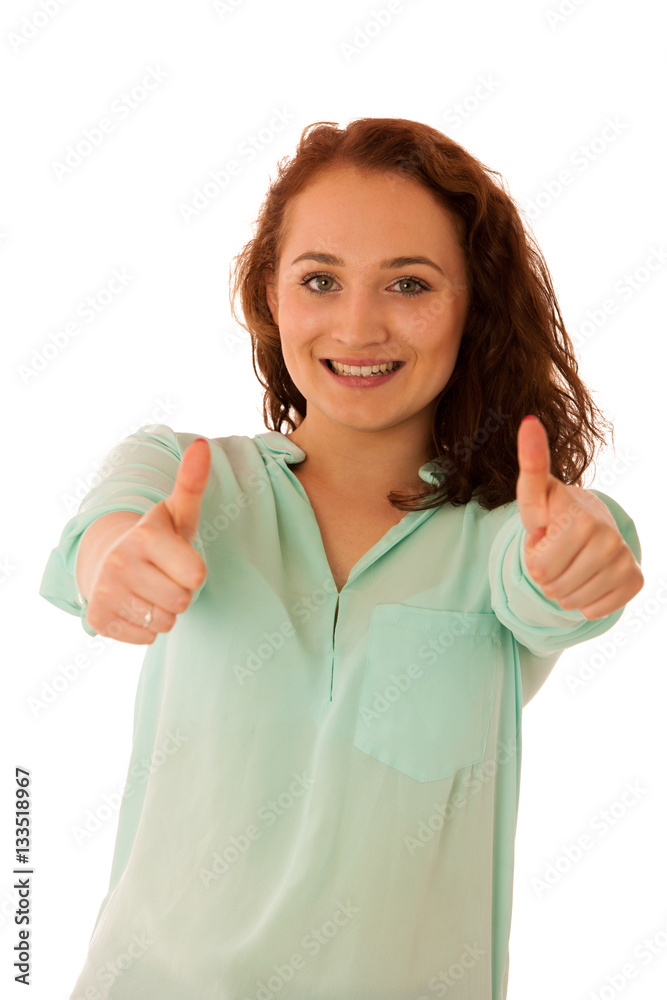Business woman showing thumb up as a gesture for success Business woman showing thumb up as a gesture for success
